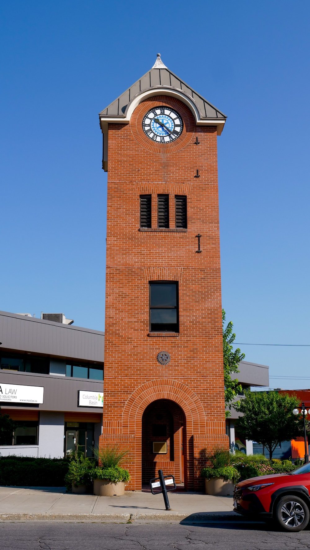 Cranbrook, British Columbia historic clock tower standing tall in the downtown core, showcasing red brick architecture and early 20th-century design, a recognizable landmark and reminder of the city’s railway and civic heritage.