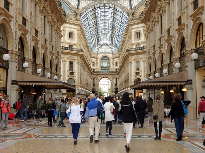 Crowds shopping at Galleria Vittorio Emanuele II in Milan, Italy