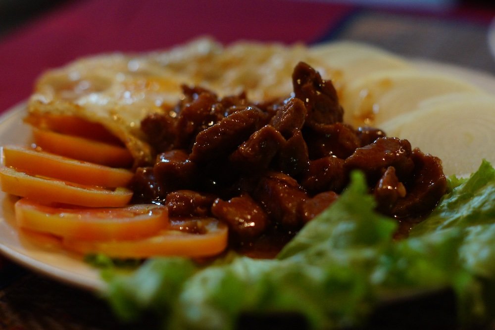 Delicious Lok Lak stir-fried beef in Battambang, Cambodia 