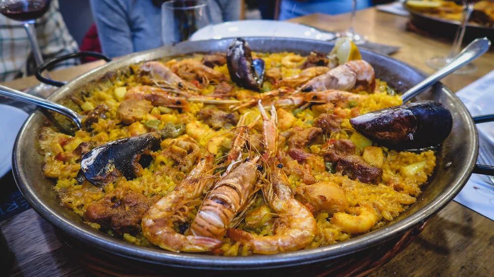 Delicious mixed seafood paella for lunch in Madrid, Spain 
