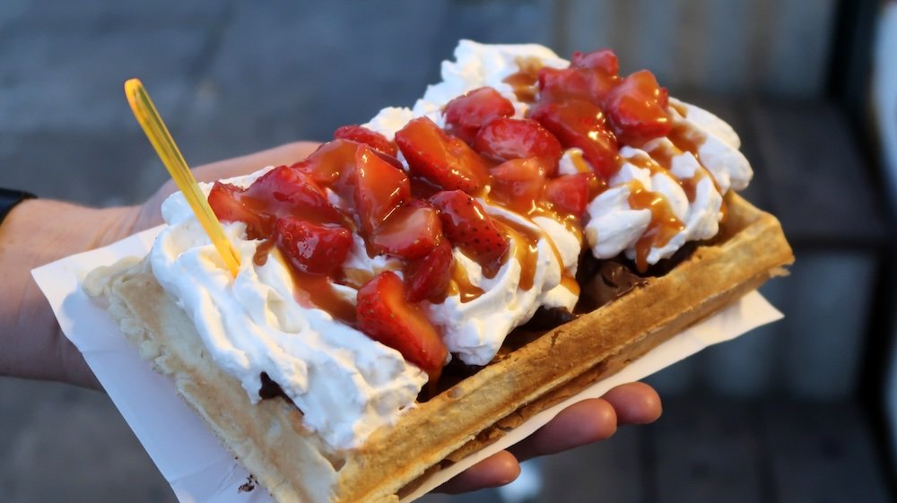 Delicious waffle with cream and berries in Dusseldorf, Germany 