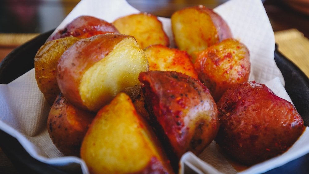 Eating rustic potatoes for lunch in Salta, Argentina 