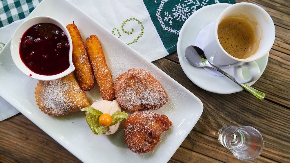 Eating Tyrolean Desserts and a Coffee at Rohrerhof in Kramsach in Tyrol, Austria