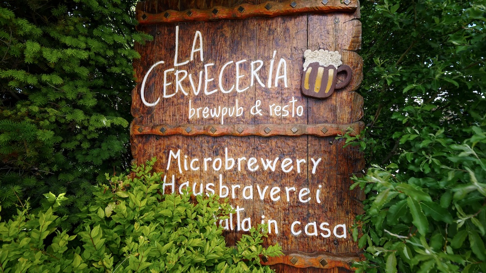 La Cervecería brewpub sign in El Chaltén, Patagonia, advertising the town’s popular microbrewery and restaurant where visitors can enjoy craft beer and hearty meals after sightseeing around Mount Fitz Roy without tackling long hikes.