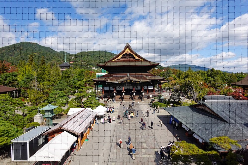 Epic high vantage point views of Sanmon Gate and Zenkoji Temple in Nagano city, Japan 