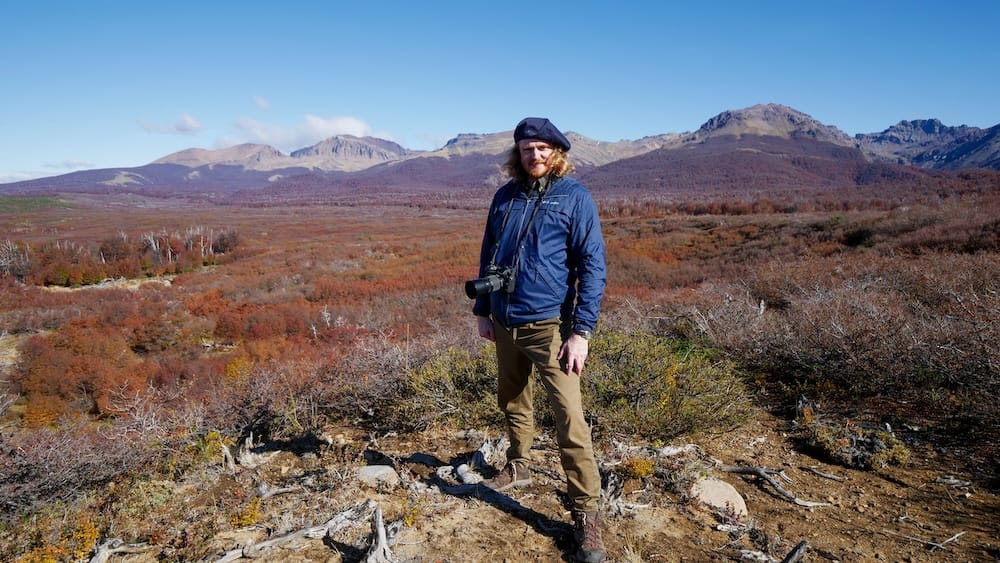 Esquel Patagonia autumn UV exposure cold weather hiking conditions Samuel Jeffery landscape Argentina Esquel Patagonia autumn landscape with Samuel Jeffery standing in cool mountain conditions under clear skies while exposed to strong UV radiation at high latitude despite cold air creating hidden sunburn risk