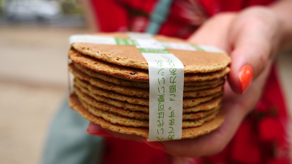 Feed the Bowing Deer at Nara Park with Shika Senbei deer crackers iconic experiences is interacting with the friendly deer that roam freely in Nara Park for around 200 Yen