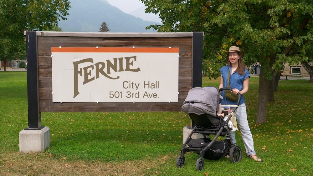 Fernie City Hall in Fernie, BC showing how walkable and stroller-friendly downtown travel can be Fernie City Hall in Fernie, British Columbia, showing Audrey Bergner pushing a stroller with baby Aurelia, highlighting how easy it is to explore downtown Fernie on foot with young children during a relaxed, family-friendly long weekend trip.
