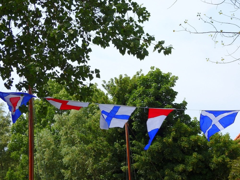 Flags flapping in the wind in Wustrow, Germany 