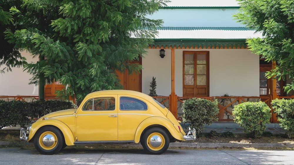 Vintage yellow classic car parked on a quiet street in Gaiman Patagonia, reflecting the town’s historic Welsh settlement atmosphere and preserved early 20th-century character in Argentina’s Chubut Valley