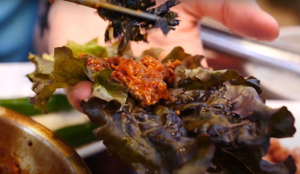 Galbi Jjim served on a lettuce wrapper in Daegu, Korea 