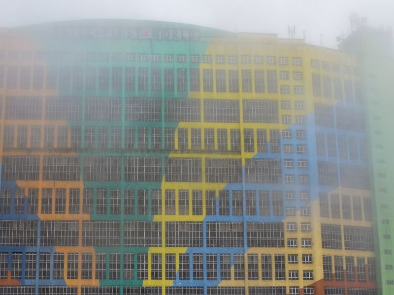 Genting Highlands multi-color building on a foggy day in Malaysia 