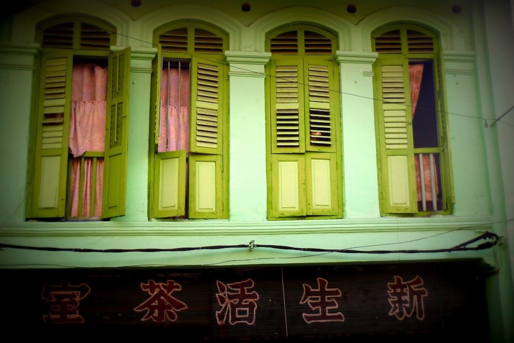 George Town colonial green shutters in Penang, Malaysia 