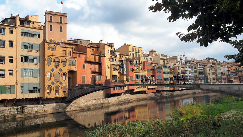 Gorgeous colorful architecture and reflections in the water during our Girona walking tour