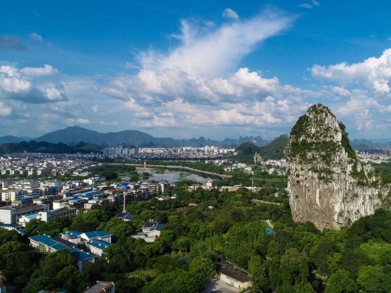 Guilin City view from a high vantage point overlooking the buildings and karst mountain in China 