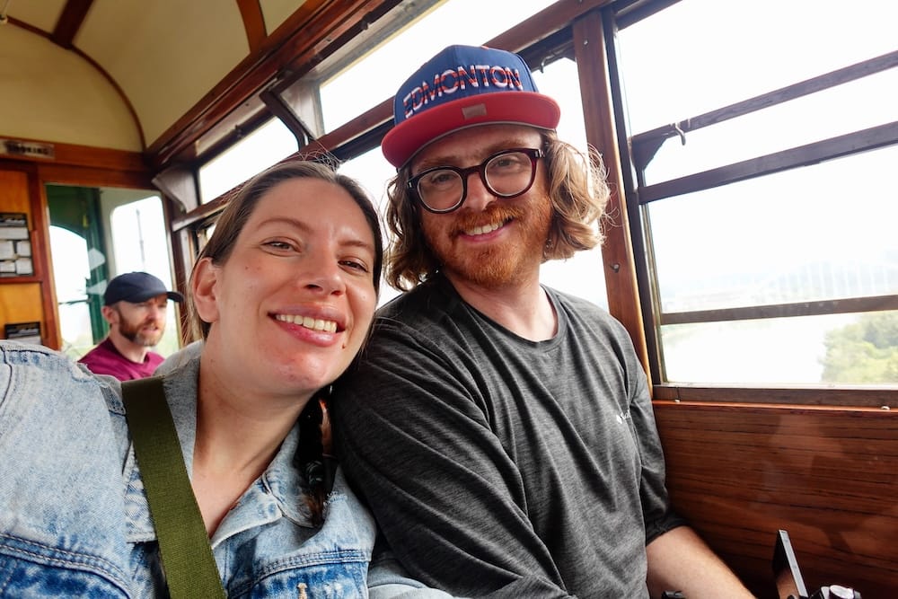 Samuel Jeffery and Audrey Bergner on Edmonton’s High Level Bridge Streetcar with a new Oilers hat Samuel Jeffery wears his new Edmonton Oilers hat while sitting beside Audrey Bergner inside the wooden High Level Bridge Streetcar in Edmonton, Alberta, Canada.