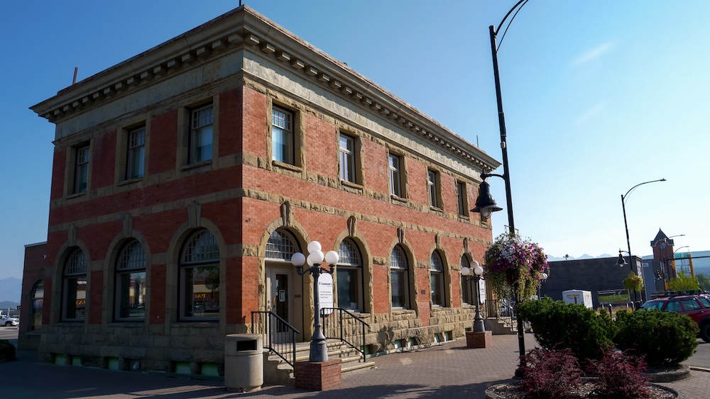 Historic Cranbrook, BC featuring a well-preserved brick heritage building in the downtown core, photographed after a walk at Elizabeth Lake Park, highlighting classic architecture, quiet streets, and how easy it is to pair nature time with a short urban stroll.
