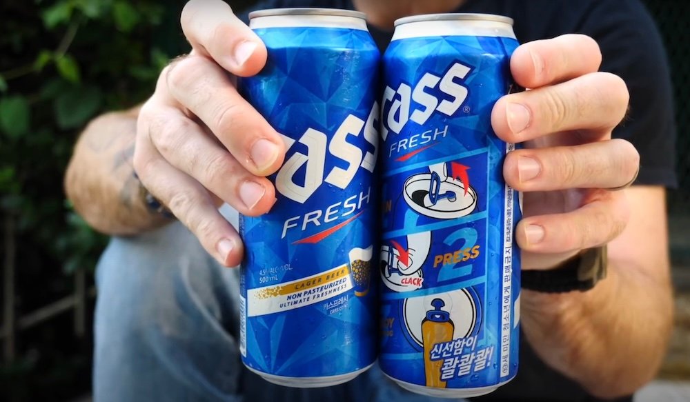 Holding up Cass Korean Beer in Busan, Korea 