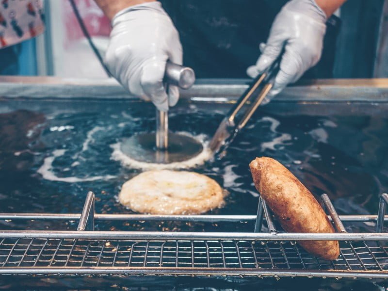 Hotteok Korean Pancake being prepared on the street in South Korea as a popular Korean street food item