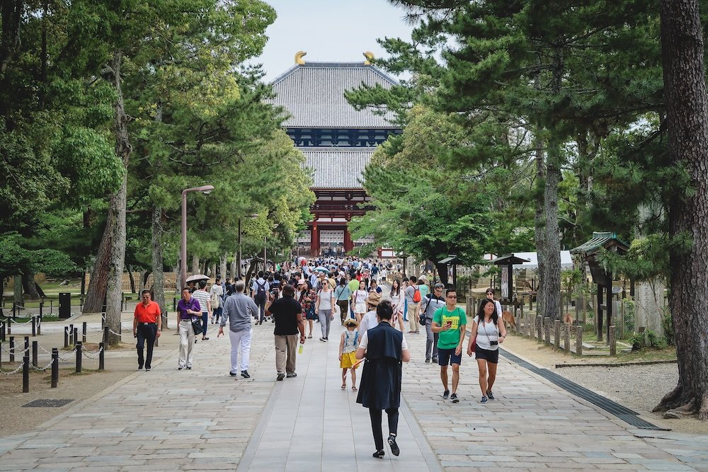 Hustle and bustle of many tourists visiting Nara, Japan 