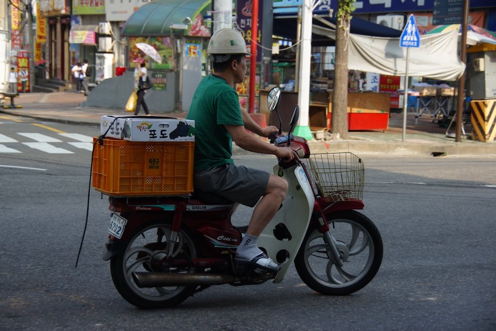 Incheon delivery man on a scooter 