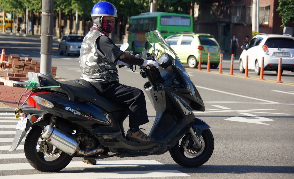 Incheon man riding a motorcycle in Korea 