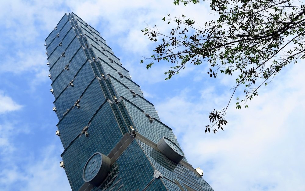 Incredible Taipei Tower framed by foliage in Taiwan 