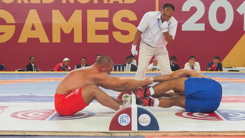 Intense Mas-wrestling match between two competitors in Kyrgyzstan
