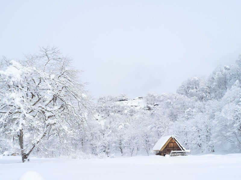 Japan winter cabin with snow covered grounds in Takayama