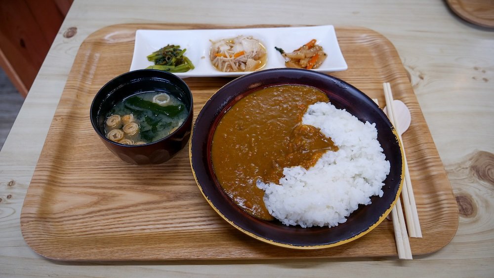 Japanese curry and rice along with miso soup for lunch at Kiyotsu Gorge, Japan