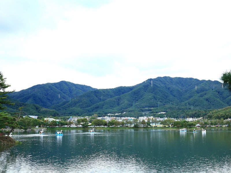 Jecheon beautiful resevoir views with a duck boats and mountain backdrop in Korea 