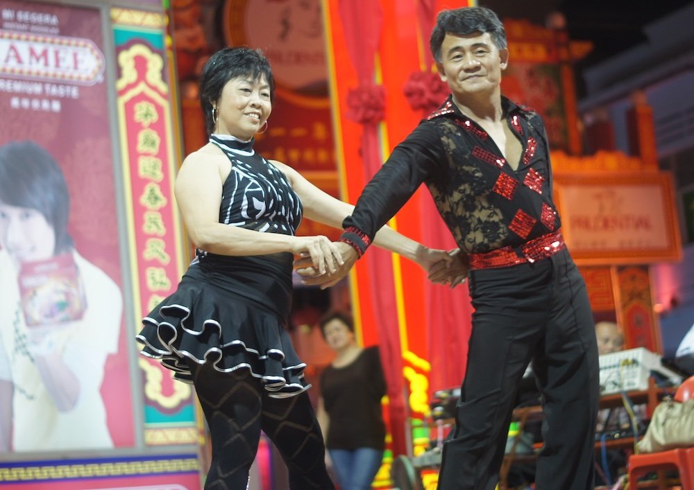 Jonker Street dancing at night in Malacca, Malaysia 