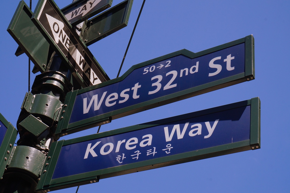 Korea Way and West 32nd Street sign post in Little Korea New York City