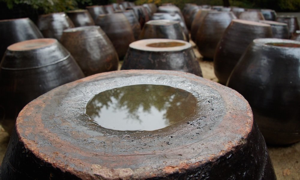 Korean Folk Art vases with water on top in Yongin, Korea 