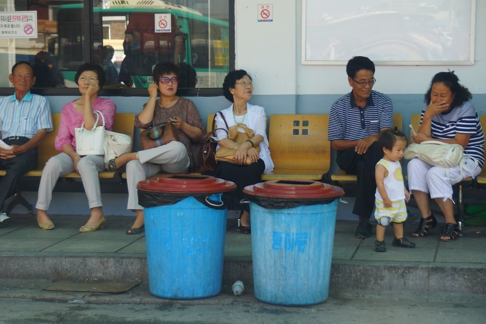 Koreans waiting for the bus stop in Cheonan, Korea 