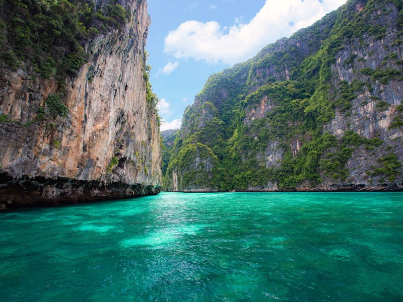 Krabi turquoise waters with scenic karst mountains in Thailand 