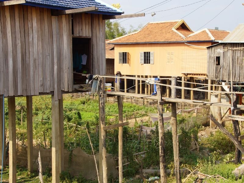 Kratie Khmer stilt houses in Cambodia with distinct rooftops 