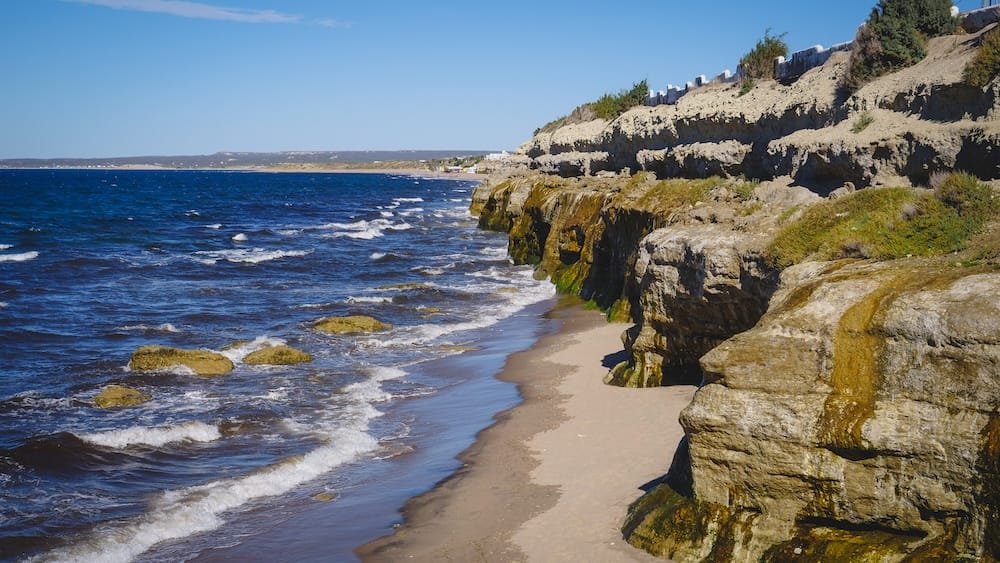 Las Grutas coastal cliffs and beach along the Atlantic Ocean in Río Negro Patagonia Argentina showing the rugged shoreline landscape typical of coastal Patagonia which contrasts strongly with the lakes and forests of the Andes.