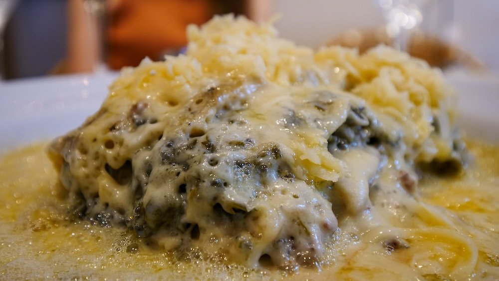 Lasagne oozing with cheese in Cordoba city, Argentina 