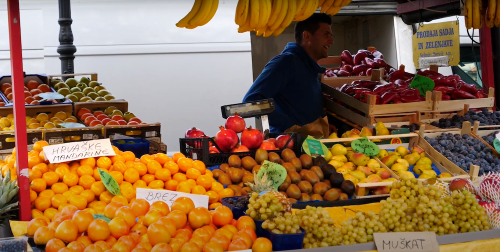 Ljubljana Central Market Osrednja ljubljanska trznica fruit display and vendor in Slovenia