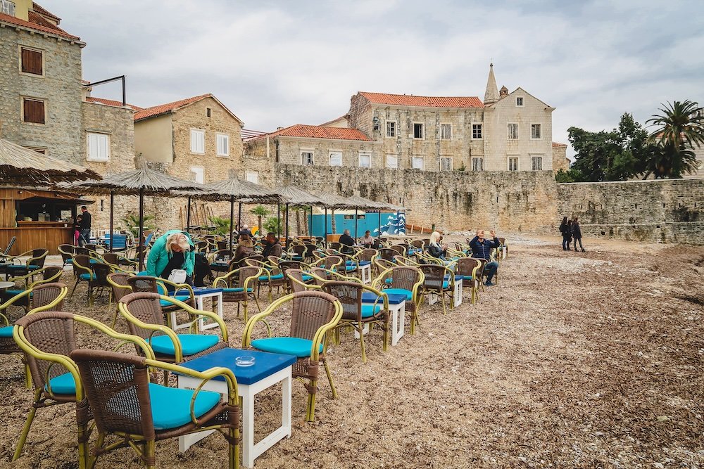 Local cafe getting set up for breakfast in Budva, Montenegro 