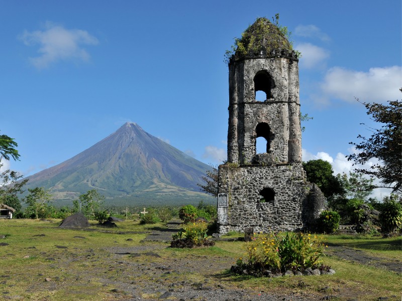 Mayon volcano and the church ruins in Bicol, Philippines 