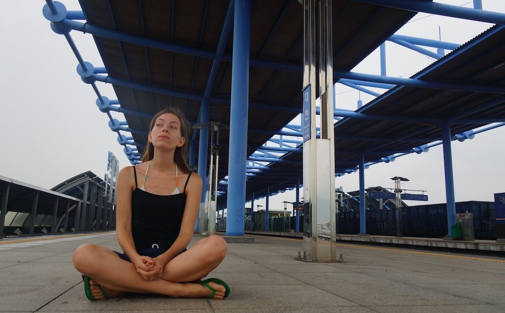 My wife Audrey Bergner of That Backpacker waiting to take the train in Korea 