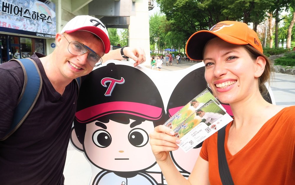 Nomadic Samuel and That Backpacker attending a baseball game in South Korea 