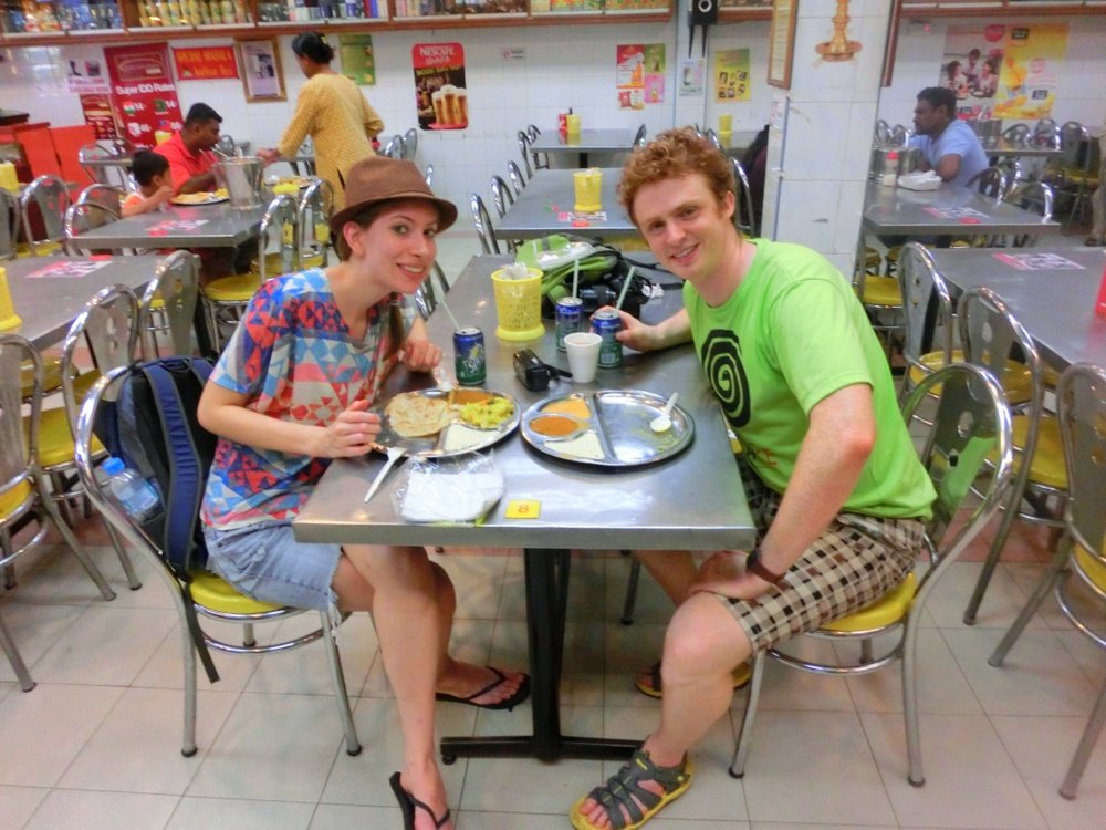 Nomadic Samuel and That Backpacker enjoying Indian food at the Batu Caves, Malaysia 