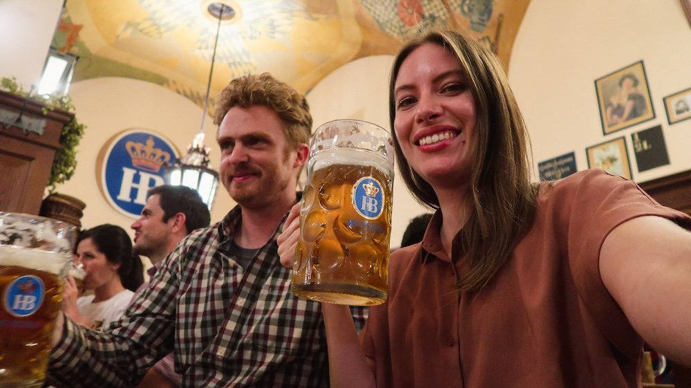 Nomadic Samuel and That Backpacker enjoying pints at Hofbrauhaus Beer Hall in Munich, Germany