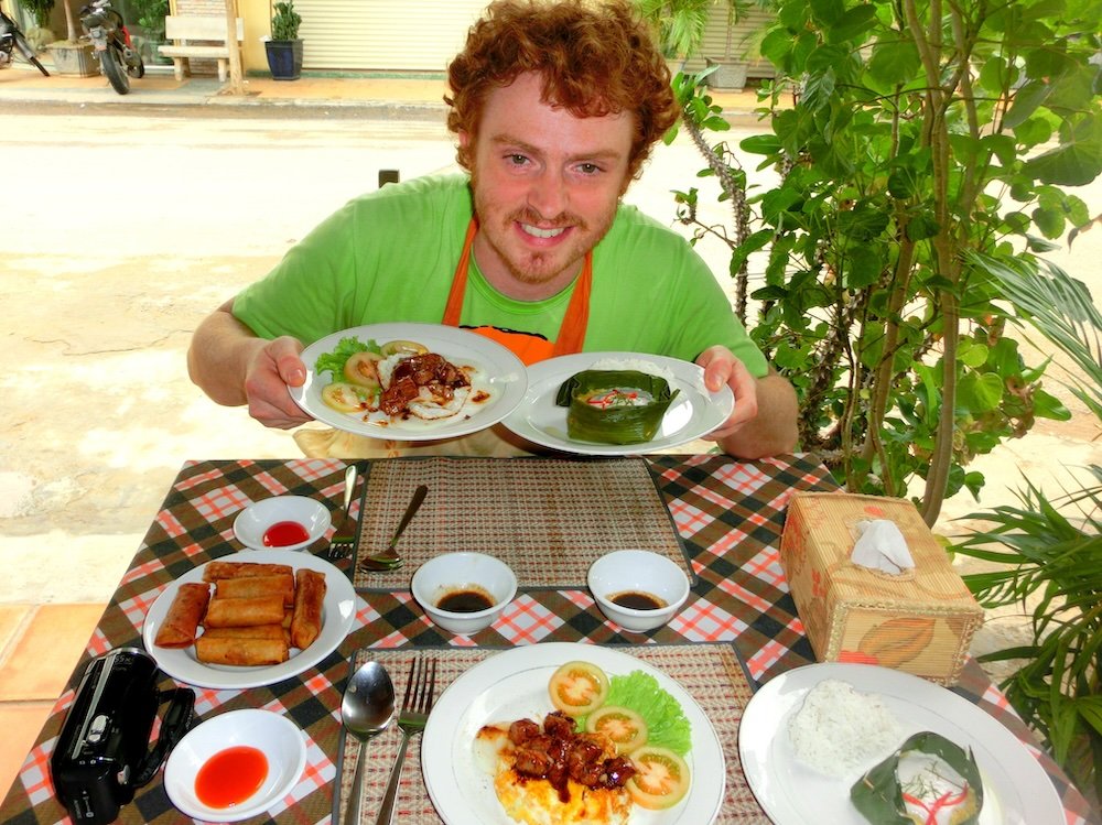 Nomadic Samuel at Nary Kitchen enjoying Khmer cooking class in Battambang, Cambodia 