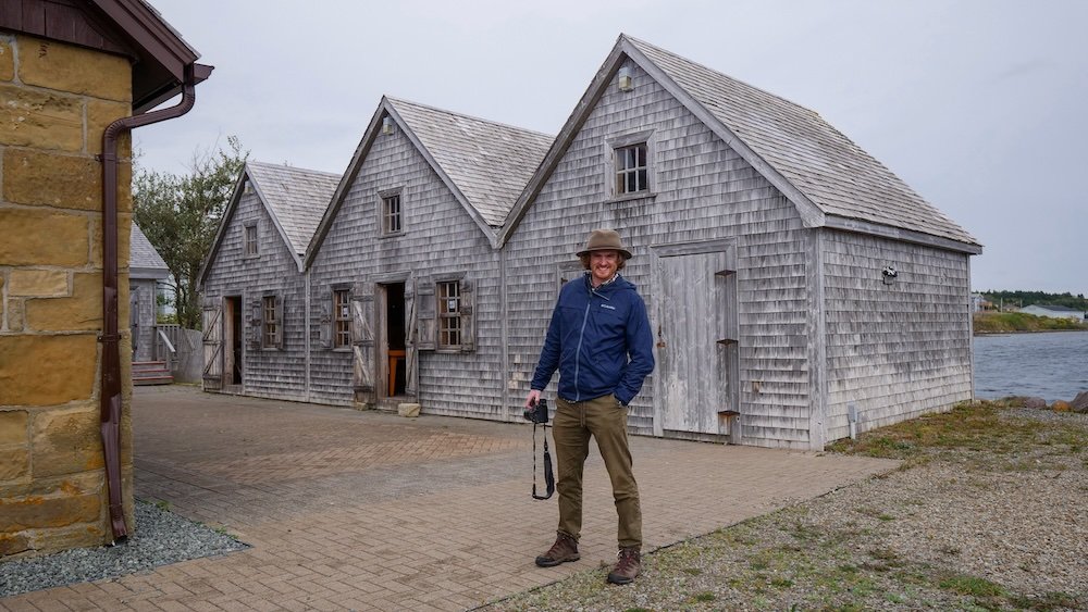 Nomadic Samuel dressing comfortably to take photos in Southern Cape Breton, Nova Scotia