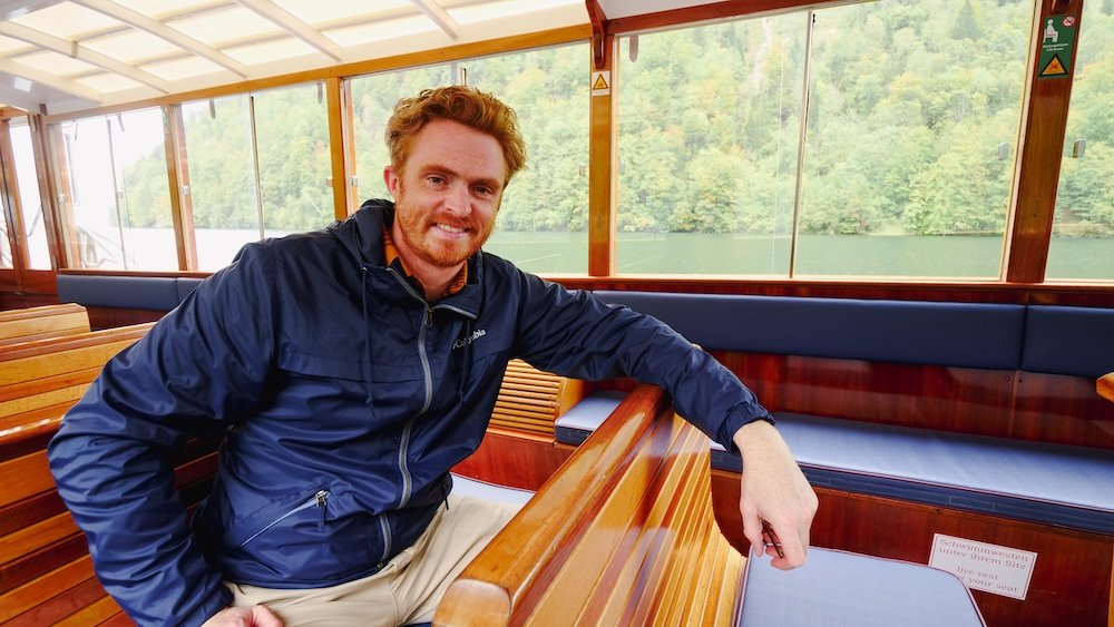 Nomadic Samuel enjoying a Boat Tour on the Emerald Waters of Königssee in Berchtesgaden, Germany