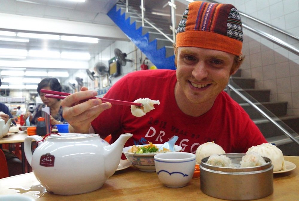 Nomadic Samuel enjoying a dim sum feast in George Town, Penang, Malaysia 